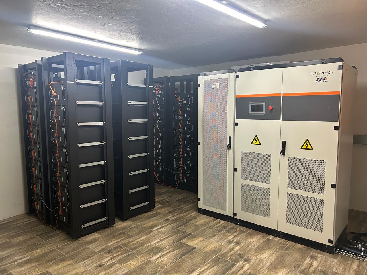 Megarevo hybrid inverter and Greenrich battery cabinets in a plant room